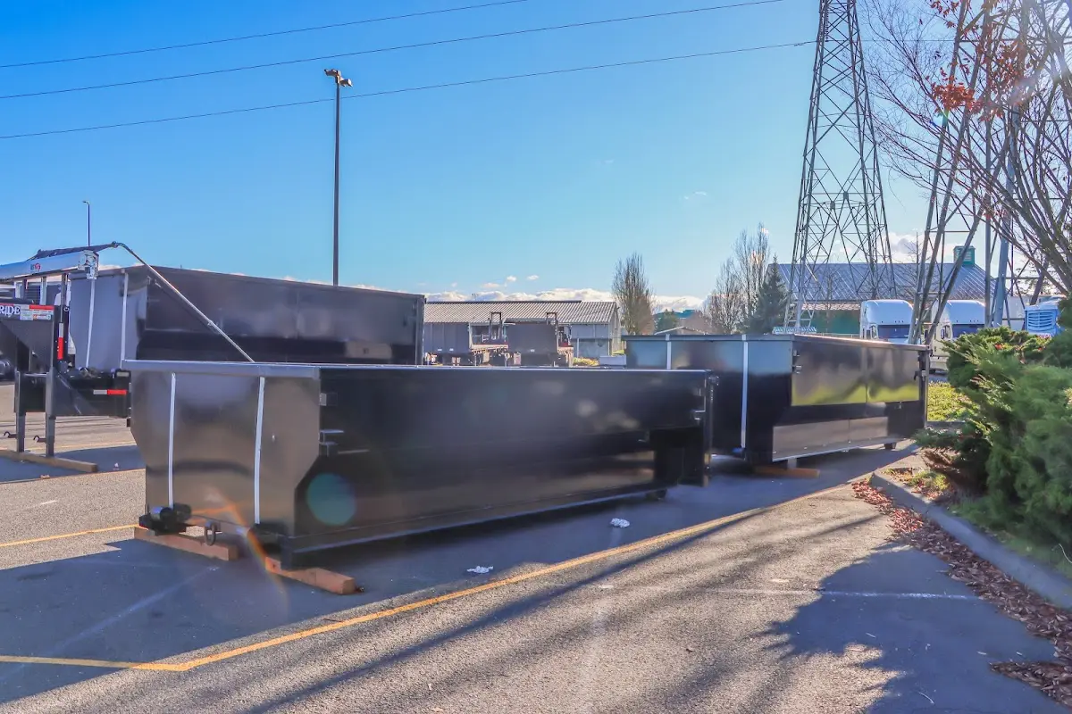 Roll-off dumpster ready for waste disposal at job site for 15 Yard Dumpster Rental in Cabot